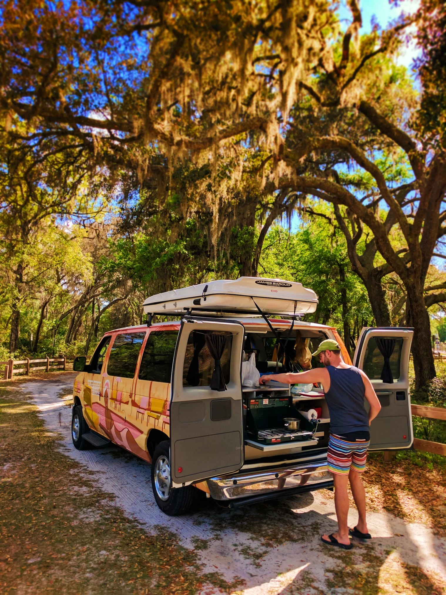 Taylor Family cooking in Escape Campervan at Rainbow Springs State Park 1