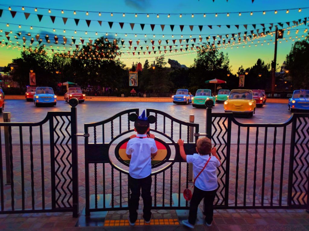Taylor Family at Luigis Rollickin Roadsters Cars Land at night Disneys California Adventure 2