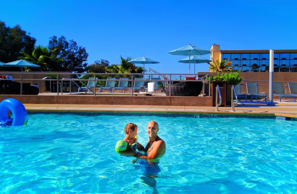 Taylor Family at swimming pool at Hyatt House Anaheim Disneyland 2