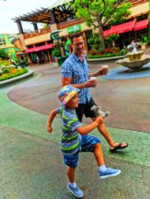 Taylor-Family-marching-through-Downtown-Disney-Disneyland-1-169x225.jpg