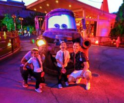 Taylor Family with Mater Cozy Cone Cars Land at night Disneys California Adventure 1