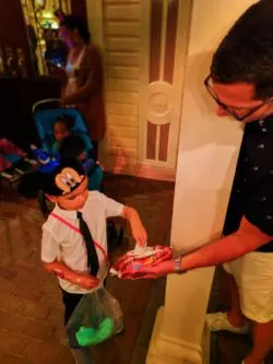 Taylor family with cotton candy Huggies Wipes in Town Square Main Street USA Disneyland KC 1