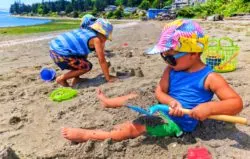 Taylor Family at Beach Wearing Little Hotdog Watson hats in Suquamish 1