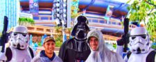 Taylor-Family-with-Darth-Vader-and-Storm-Troopers-Tomorrowland-Disneyland-1-225x89.jpg