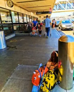 Taylor Family with REI and Trunki luggage at airport 2