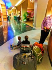 Taylor-Family-with-REI-and-Trunki-luggage-at-hotel-1-169x225.jpg