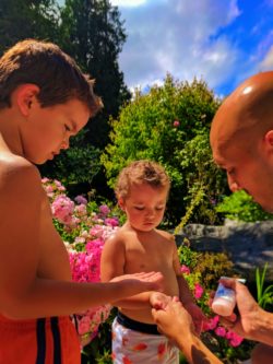 Taylor family using sunblock lotion 1