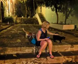 Maureen with Cats on Callejon Hospital in Old San Juan Puerto Rico at night 1