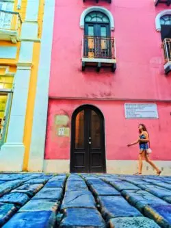 Woman with Colorful row houses in Old San Juan Puerto Rico 3