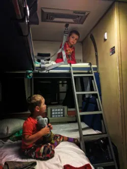 Taylor Family in bunk beds sleeping cab Amtrak Empire Builder 4