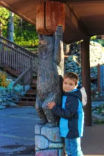 Taylor Family with Bear carving at West Glacier Amtrak Train Station 1