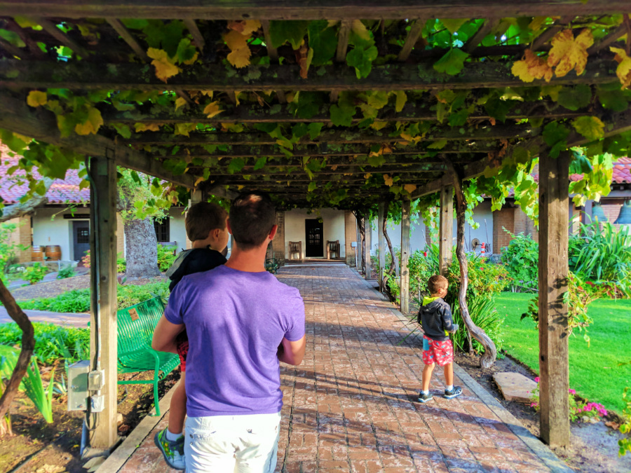 Taylor Family with grape vines at Mission San Luis Obispo 1