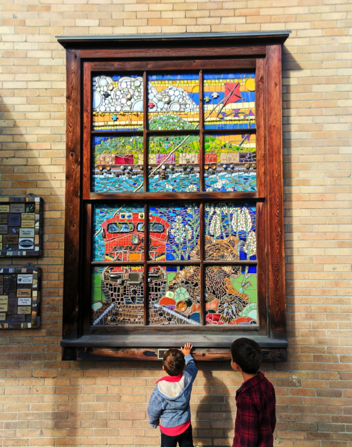 Taylor Family with mosaics downtown Whitefish Montana 1