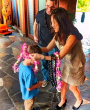 Taylor Family arriving at Disney Aulani receiving leis