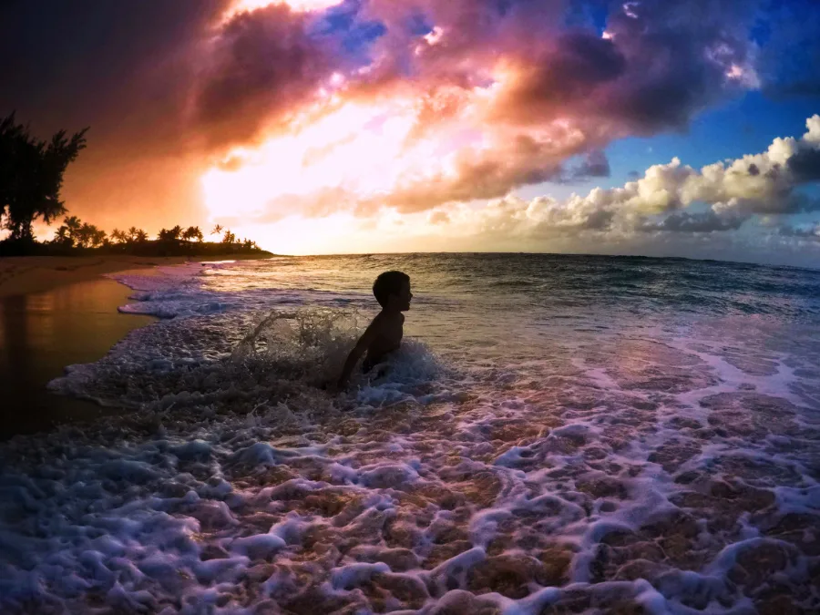 Taylor Family playing at Sunset Beach Haleiwa North Shore Oahu Sunset