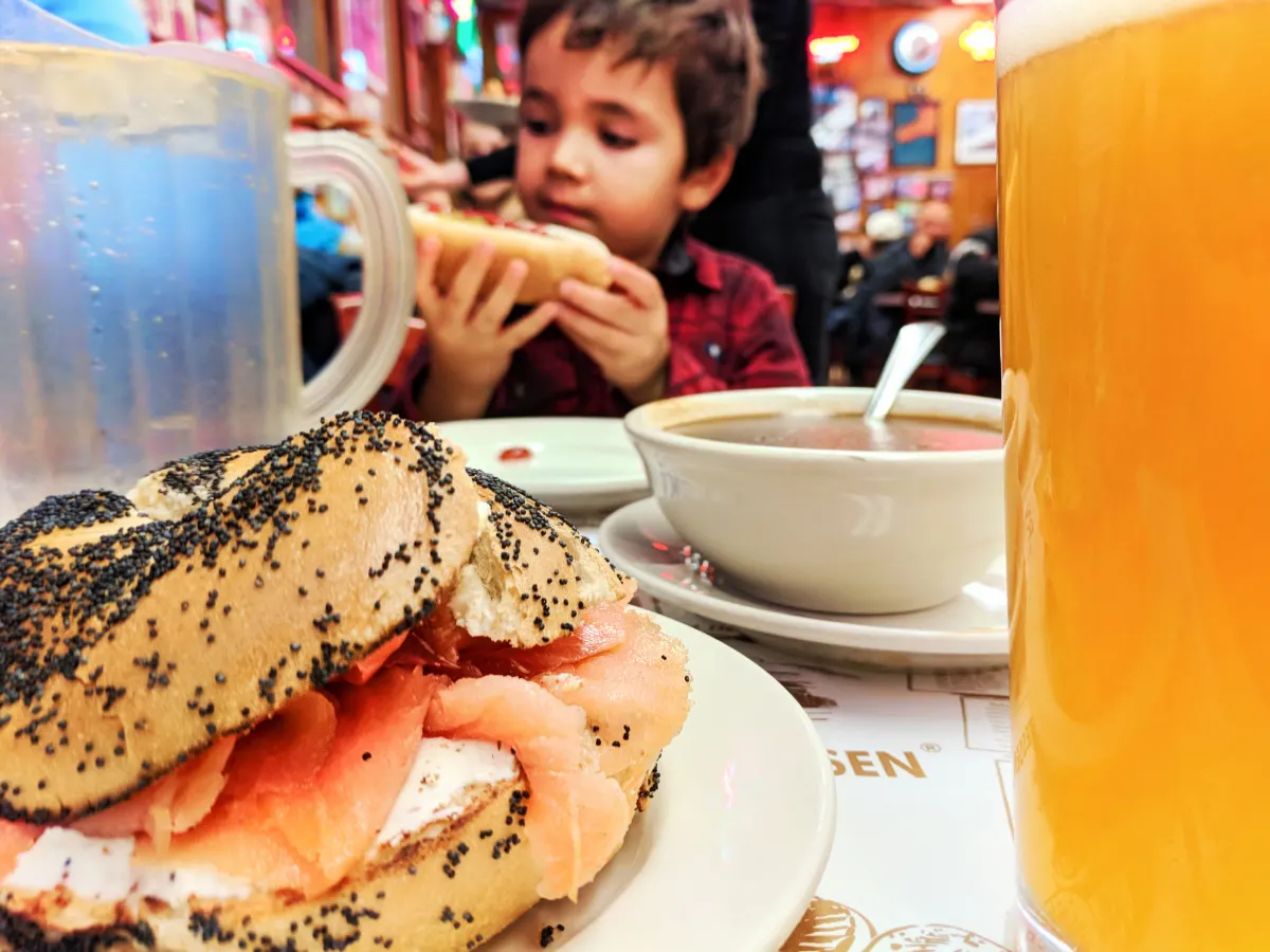 Taylor Family with Lox on poppy seed bagel at Katzs Delicatessen NYC with Kids 1