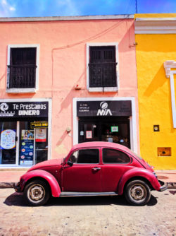 VW Bug and Colorful buildings on sidestreet in Valladolid Yucatan road trip 11