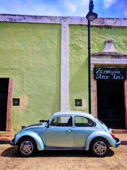VW Bug and Colorful buildings on sidestreet in Valladolid Yucatan road trip 6