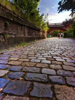 Cobblestone pathway along Main River Frankfurt Germany 1