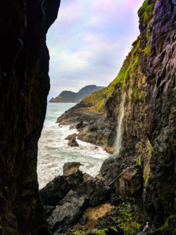 Haceta Head Lighthouse at waterfall at Sea Lion Caves Florence Oregon Coast 2