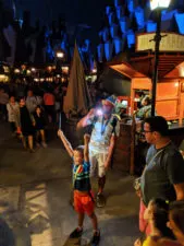 Taylor Family Casting Spells in Hogsmeade Wizarding World of Harry Potter Universal Islands of Adventure 3