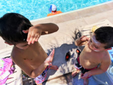 Taylor-Family-with-sunblock-by-pool-at-Universal-Cabana-Bay-Resort-Orlando-Florida-1-225x169.jpg
