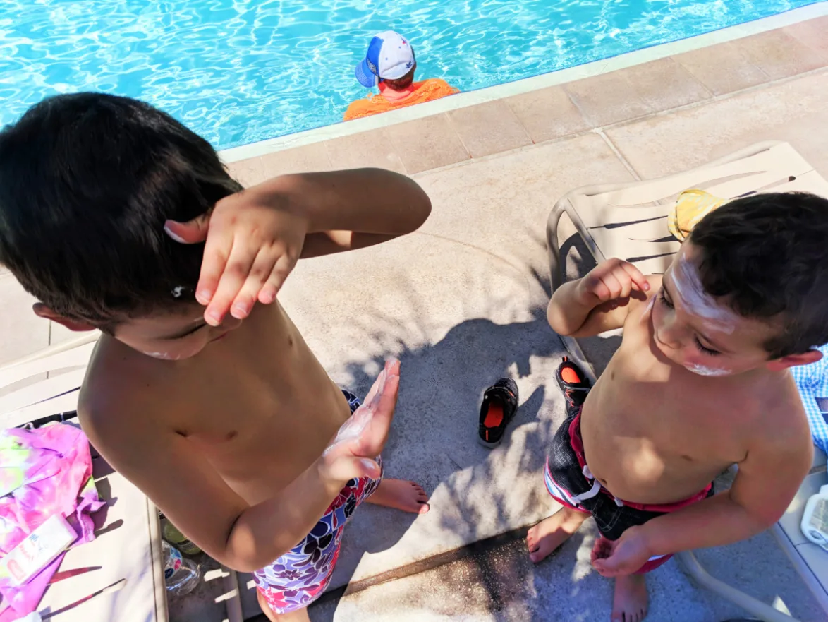 Taylor Family with sunblock by pool at Universal Cabana Bay Resort Orlando Florida 1