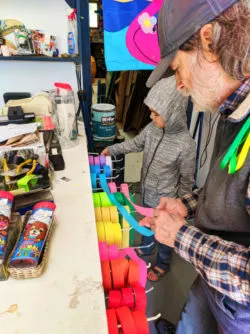 Taylor family buying Kites in Kite shop at Pacific City Oregon Coast 2