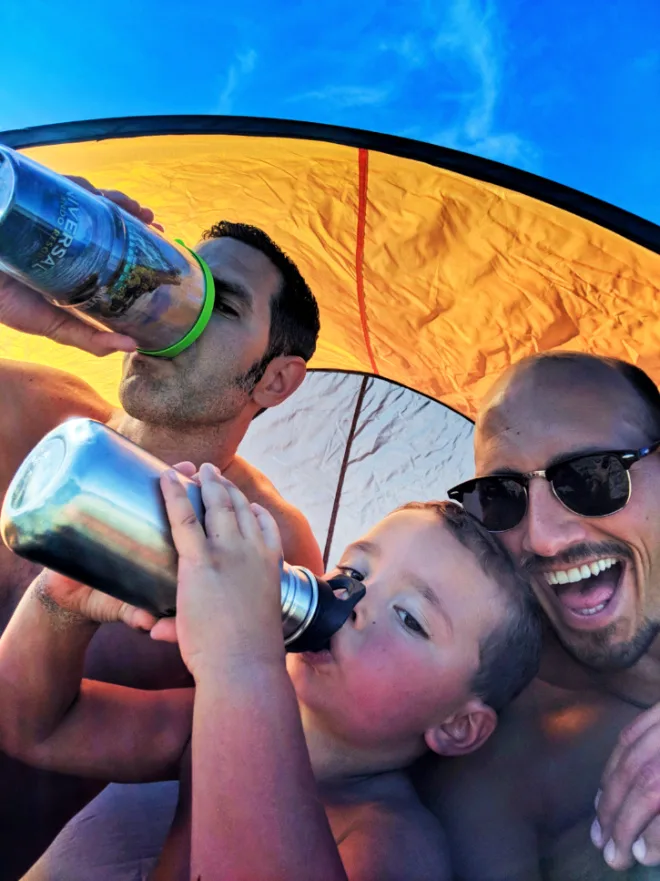 Taylor Family at beach with sun protection tent Suquamish Washington 2