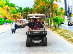 FIAL Frank and BJ in golf cart Isla Mujeres Quintana Roo Mexico 1