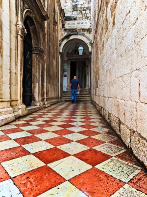 Checker alleyway heading to Franciscan Monastary Cloister Museum Old Town Dubrovnik Croatia 1