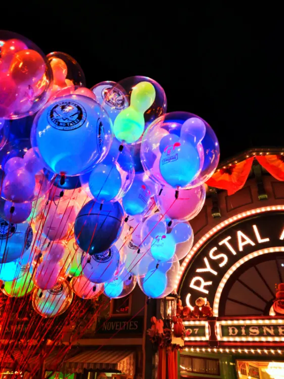 Colorful balloons at Disneyland on Main Street USA at night 1