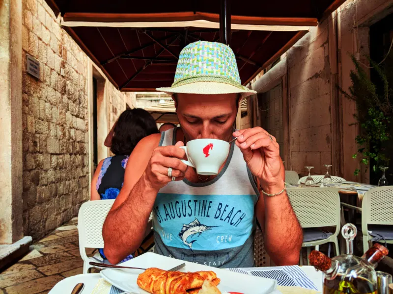 Rob Taylor drinking espresso in Old Town Dubrovnik Croatia 1