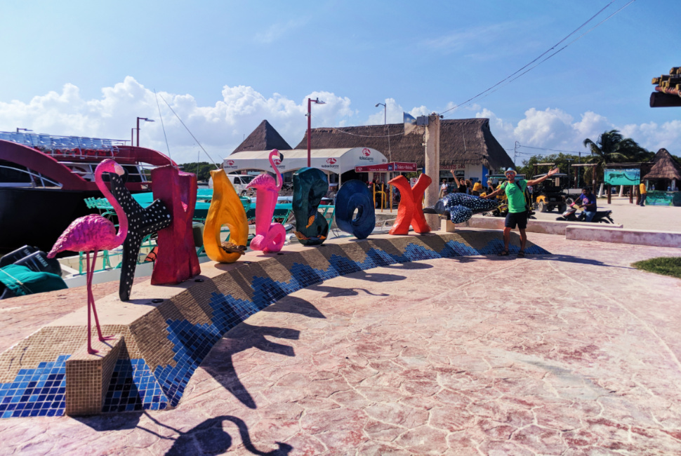 Rob-Taylor-with-Isla-Holbox-Colorful-sign-Quintana-Roo-Mexico-1.jpg