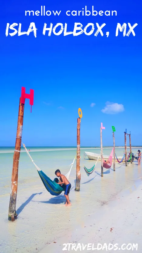 A trip to Isla Holbox, Mexico is the perfect Caribbean getaway. Still small and undeveloped, the perfect waters, flamingos, tropical mangroves and colorful town make it a dream destination. 2traveldads.com