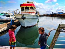 Taylor-Family-with-boats-in-Marina-in-Downtown-Westport-Washington-Coast-1-225x169.jpg