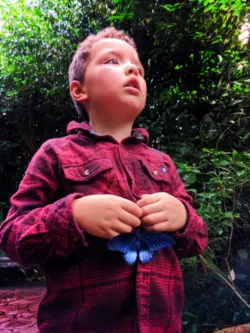 Taylor Family with butterfly at Victoria Butterfly Gardens Victoria BC 4