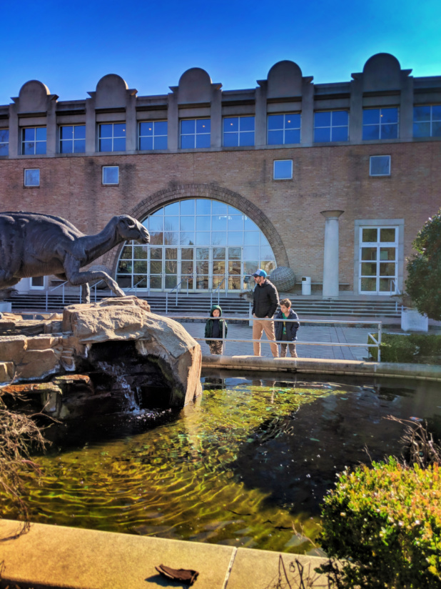 Taylor Family with Dinosaur sculpture at Fernbank Museum of Natural History Atlanta 1