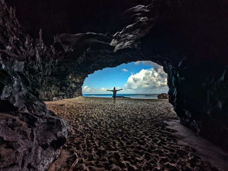 Chris Taylor in sea cave at Hanakapi`ai Beach Na Pali Coast Kalalau Trail Haena State Park Kauai Hawaii 1