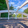 Chris Taylor riding bikes on Rainbow Bridge Hilo Big Island Hawaii 1