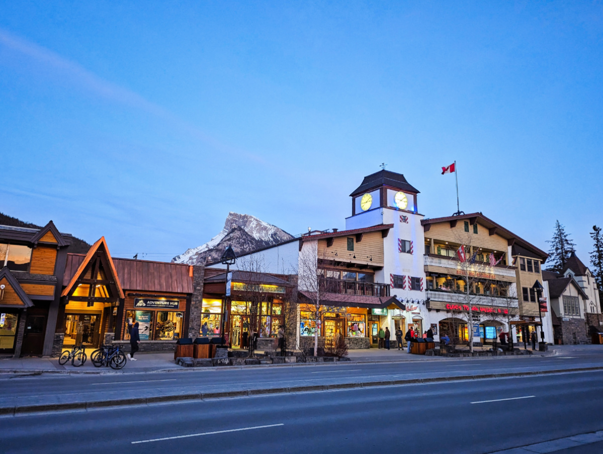 Downtown Banff with Canadian Rockies at Sunset Banff Alberta 1