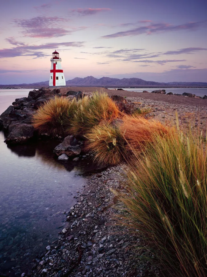 Dedicated in September 2006, the replica East Quoddy Lighthouse sits at the intersection of Windsor Beach and Bridgewater Channel in Lake Havasu City, Arizona