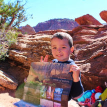 Elliott looking at map in Zion National Park Utah 3
