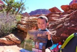 Elliott looking at map in Zion National Park Utah 3