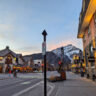 Exterior of Mount Royal Hotel with Canadian Rockies at Sunset downtown Banff Alberta 1