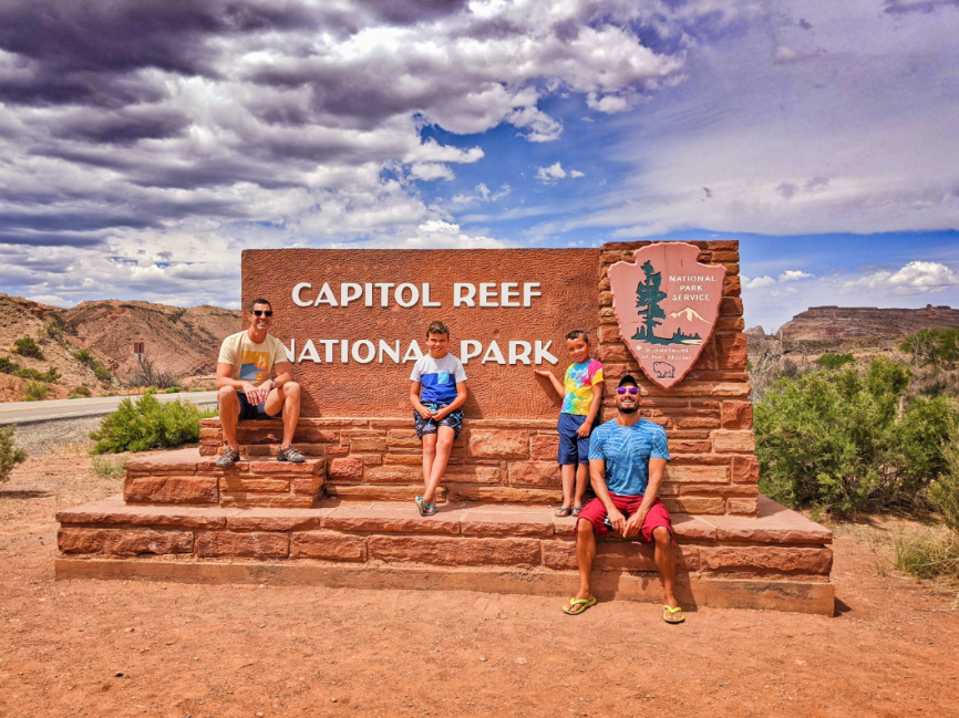 Full Taylor Family at Capitol Reef National Park Entrace Sign Utah 2