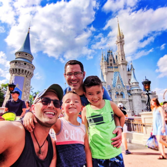 Full Taylor Family at Cinderellas Castle Magic Kingdom Disney World Florida 3