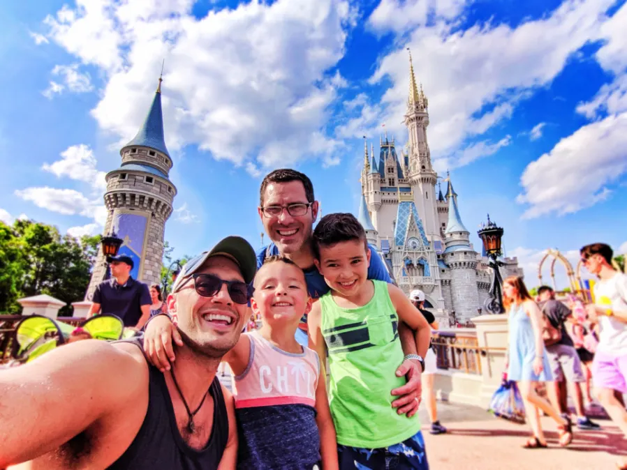 Full Taylor Family at Cinderellas Castle Magic Kingdom Disney World Florida 3