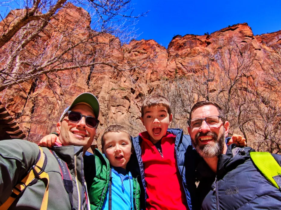 Full Taylor Family at Red Rock walls of Zion Canyon Zion National Park Utah 1