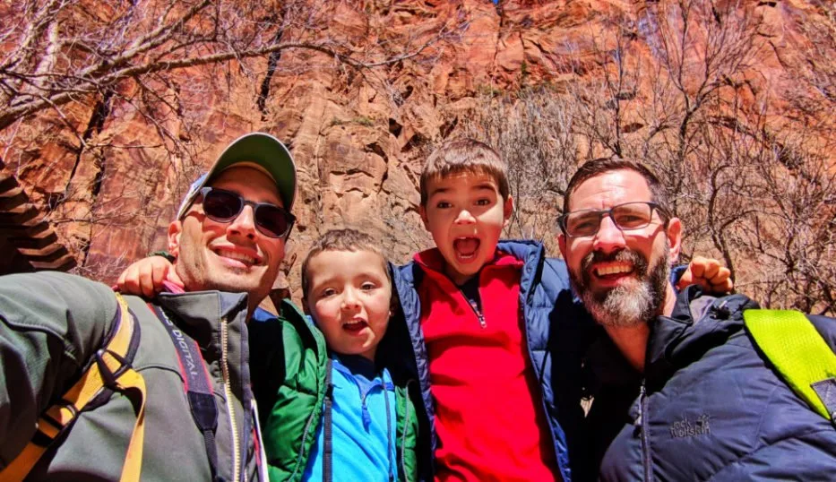 Full Taylor Family at Red Rock walls of Zion Canyon Zion National Park Utah 1
